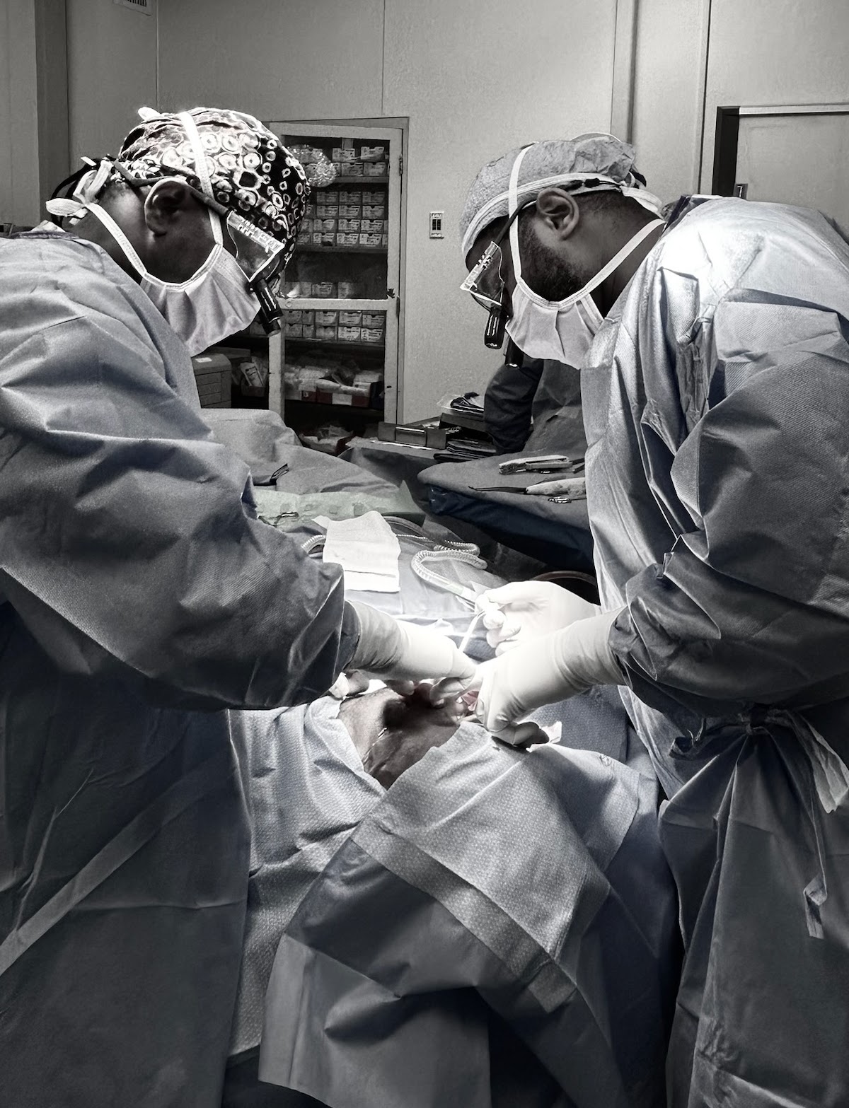 Surgical team operating together.